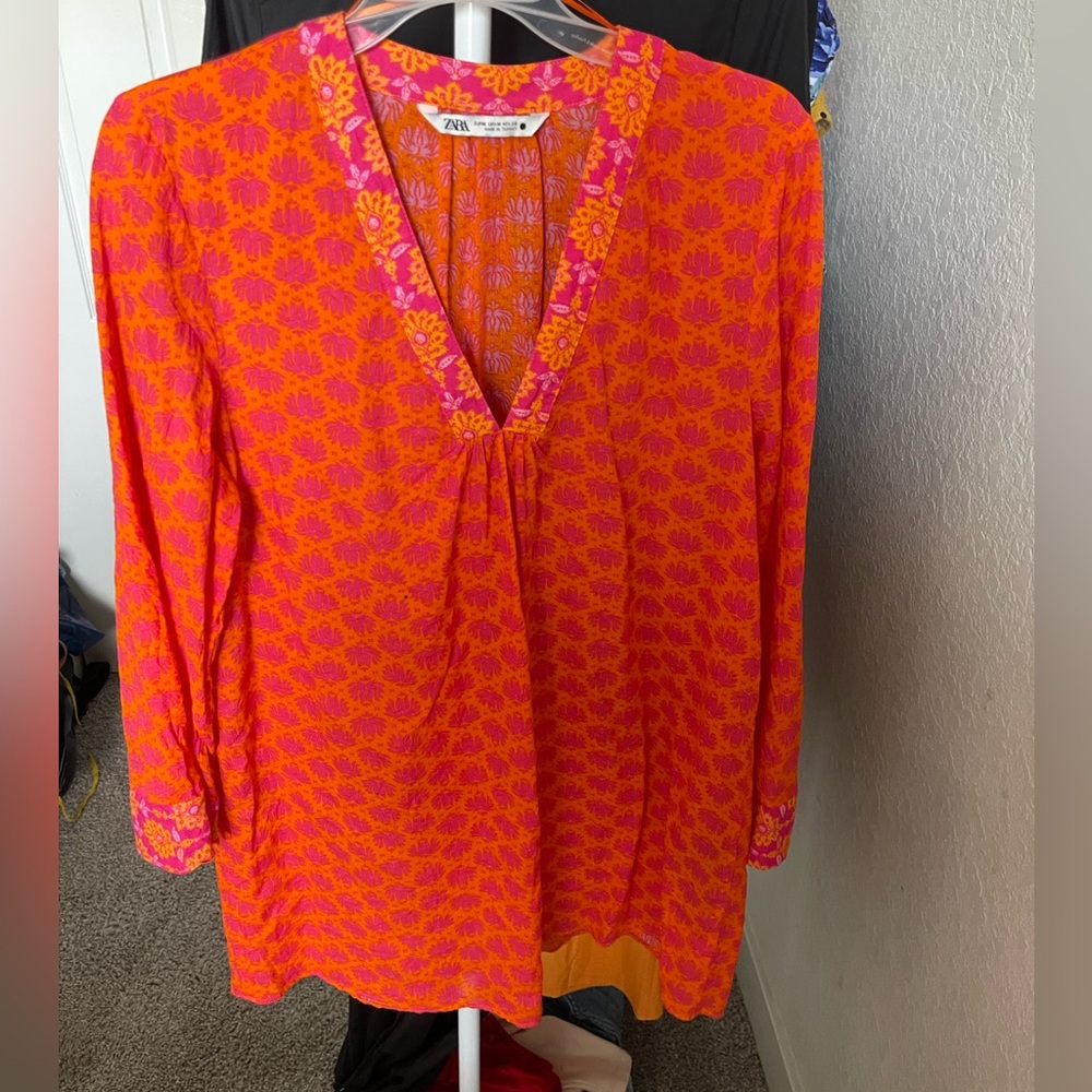 I don't use it anymore and it's in good condition. Beautiful Zara beach Dress.